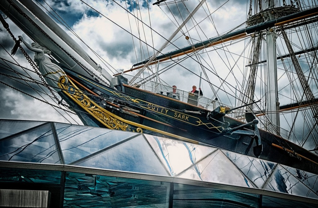 The black and gold hull of the Cutty Sark. A tea clipper on display in Greenwich