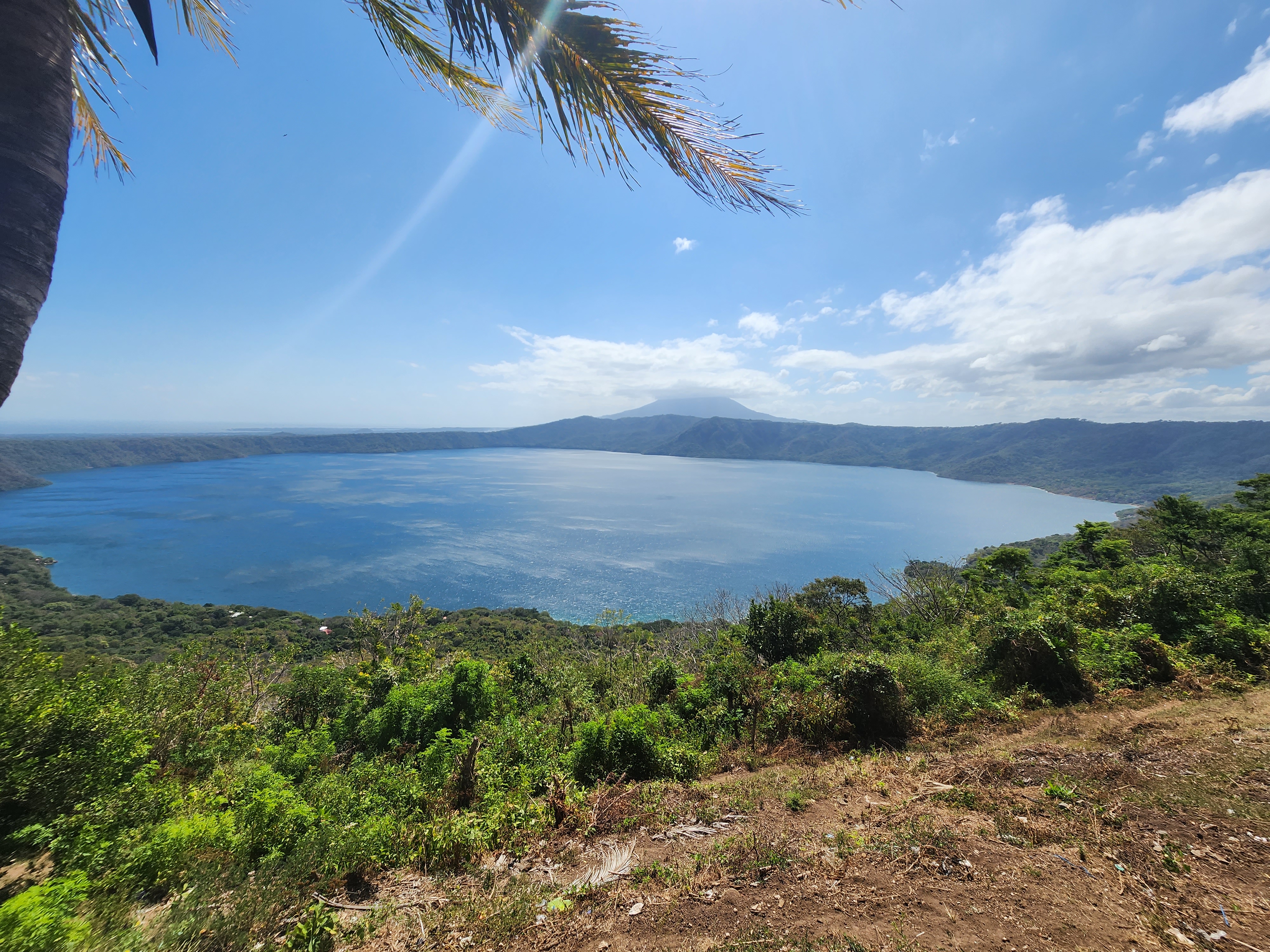 A brilliantly blue volcanic caldera (crater lake) in Nicaragua