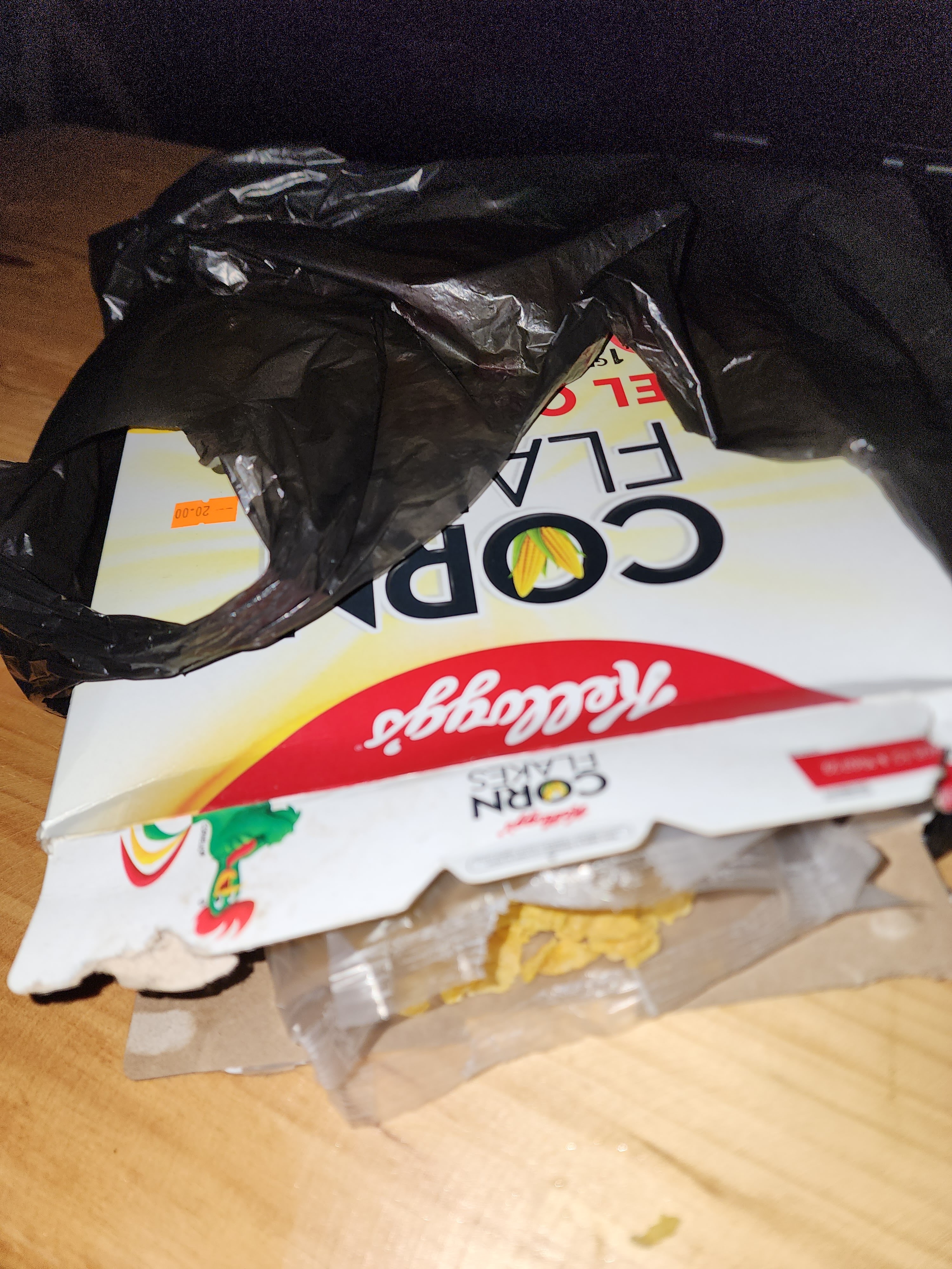 An open box of corn flakes